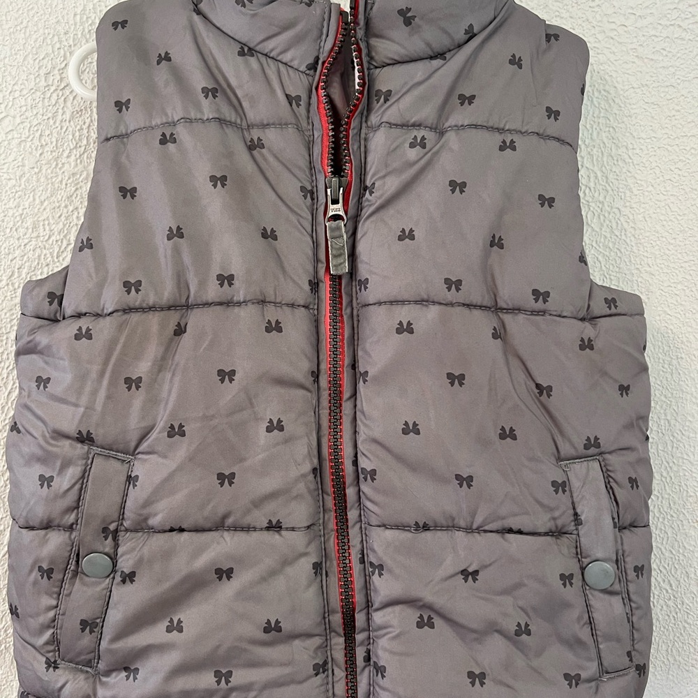 Gray Puffer Vest with Bow Pattern